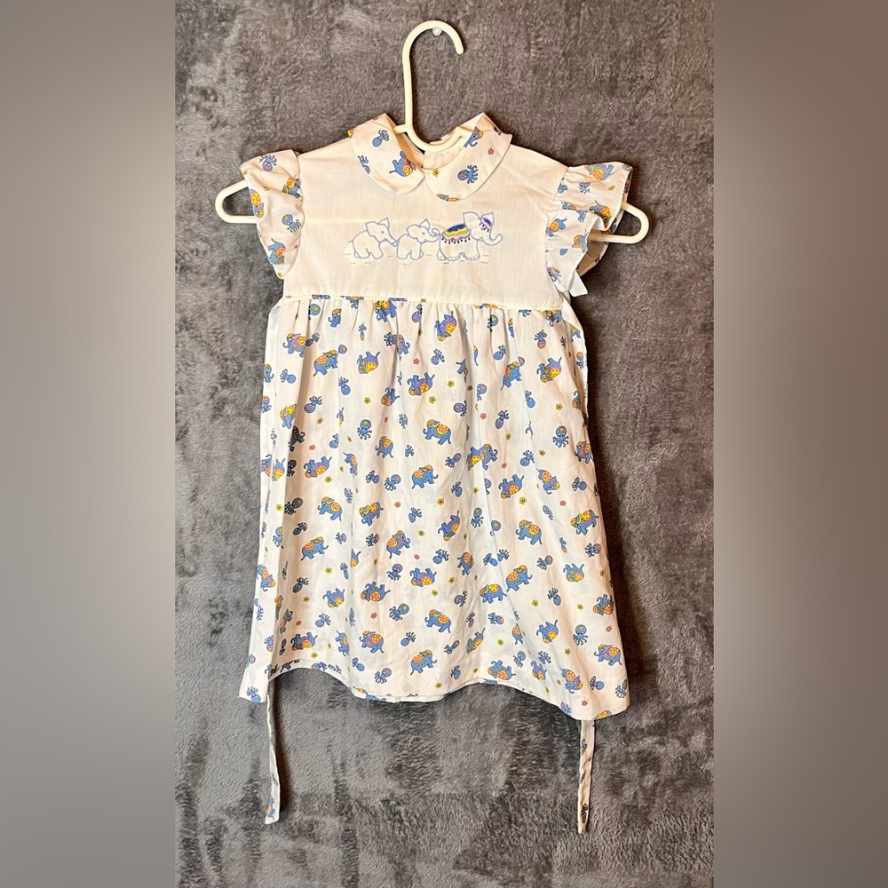 Vintage 70’s/80’s White Cotton Baby Dress with Blue & Yellow Elephant Print